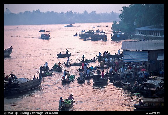 Busy river  at sunrise. Can Tho, Vietnam (color)