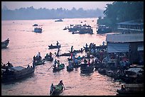 Busy river  at sunrise. Can Tho, Vietnam (color)