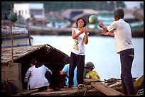 Unloading watermelons from a boat. Ha Tien, Vietnam