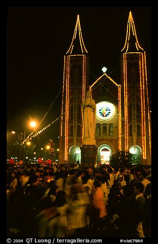 Crowds gather at the Cathedral St Joseph for Christmans. Ho Chi Minh City, Vietnam (color)