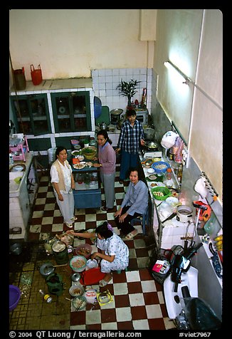 Women in a home kitchen. Ho Chi Minh City, Vietnam (color)