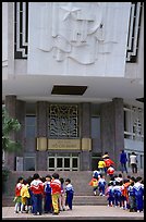 School children visiting Ho Chi Minh museum. Hanoi, Vietnam