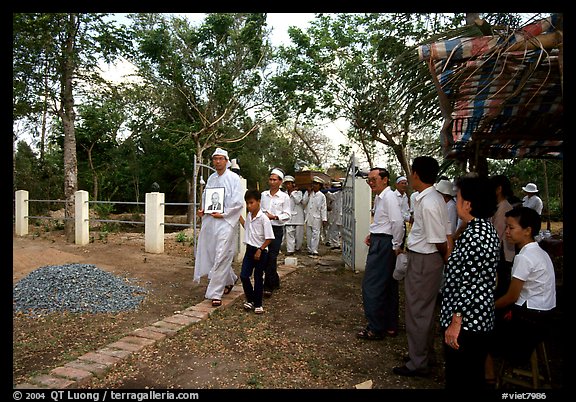 Procession at a countryside funeral. Ben Tre, Vietnam (color)