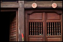 Detail of a wooden facade, Hoi An. Hoi An, Vietnam (color)