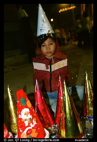 Child on Christmas night. Ho Chi Minh City, Vietnam (color)