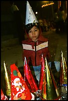 Child on Christmas night. Ho Chi Minh City, Vietnam