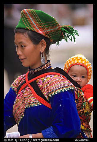 Young Flower Hmong woman and baby. Bac Ha, Vietnam (color)