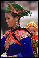 Young Flower Hmong woman and baby. Bac Ha, Vietnam