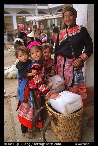 Flower Hmong mother with daughters. Bac Ha, Vietnam (color)