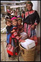 Flower Hmong mother with daughters. Bac Ha, Vietnam