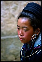 Black Hmong girl in everyday ethnic dress, Sapa. Vietnam
