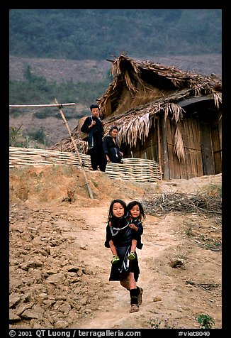 Black Hmong girl and family. Sapa, Vietnam