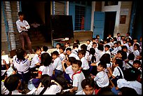 Children at school. Like everywhere else in Asia, uniforms are the norm. Ho Chi Minh City, Vietnam ( color)