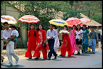 Traditional wedding procession on a countryside road. Ben Tre, Vietnam