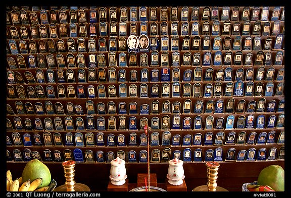 Pictures of the deceased for veneration on altar. Ho Chi Minh City, Vietnam