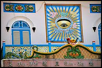 The Cao Dai religion most noteworthy symbol is the all seeing  eye. Tay Ninh, Vietnam (color)