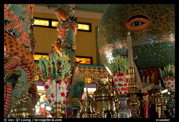 Globe with Cao Dai eye inside the great temple. Tay Ninh, Vietnam (color)