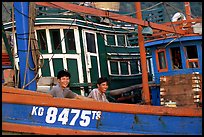 Fishermen on a commercial fishing boat. Ha Tien, Vietnam