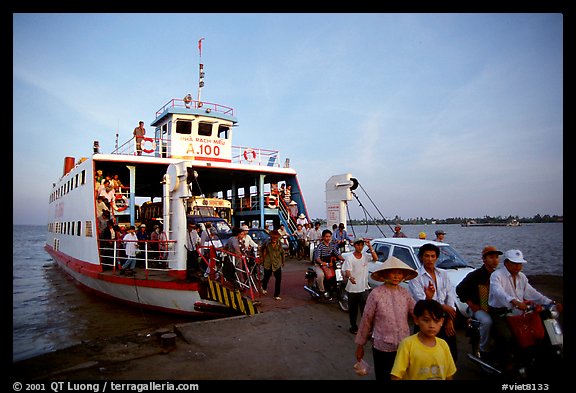 Disembarking from a ferry on one of the many arms of the Mekong. My Tho, Vietnam