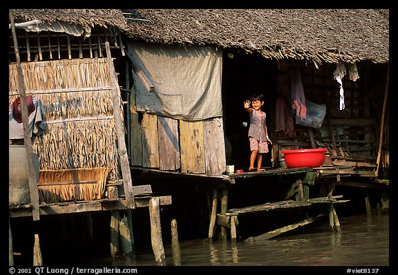 Housing at the edge of the canal, Phung Hiep. Can Tho, Vietnam (color)
