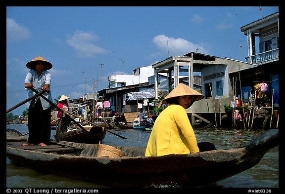 River at the back of townhouses, more used than the road at the front, Phung Hiep. Can Tho, Vietnam (color)