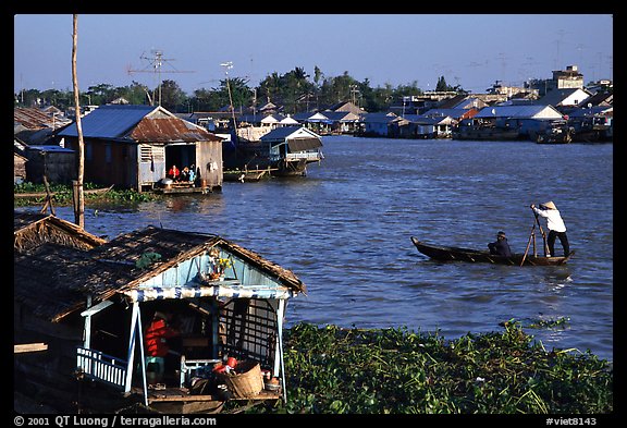 Floating houses on the Hau Gian river. Chau Doc, Vietnam (color)