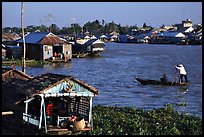 Floating houses on the Hau Gian river. Chau Doc, Vietnam (color)