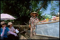 Buying groceries on the Phong Dien floating market. Can Tho, Vietnam