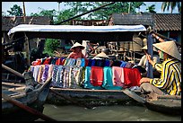 Garnments for sale on the Phong Dien floating market. Can Tho, Vietnam (color)