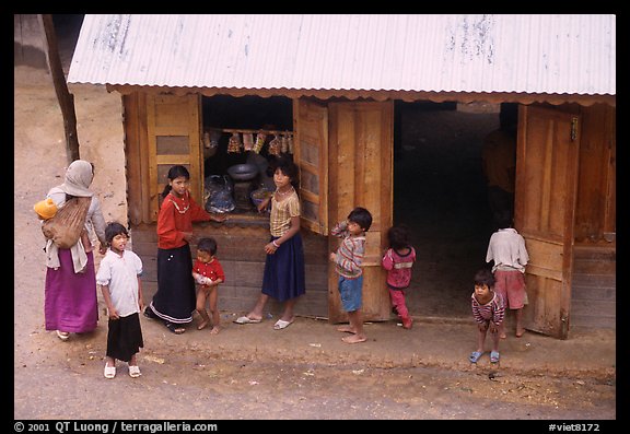 Gathering at the village store, in a minority village. Da Lat, Vietnam (color)