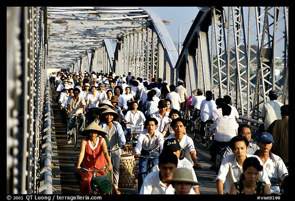 Rush hour on the Trang Tien bridge. The numbers of cars is insignificant compared to Ho Chi Minh city. Hue, Vietnam (color)