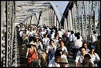 Rush hour on the Trang Tien bridge. The numbers of cars is insignificant compared to Ho Chi Minh city. Hue, Vietnam (color)