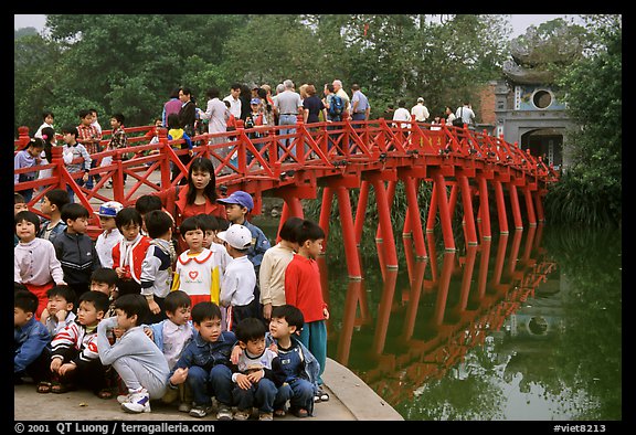 School children at The Huc bridge, Hoan Kiem lake. Hanoi, Vietnam (color)