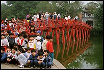 School children at The Huc bridge, Hoan Kiem lake. Hanoi, Vietnam (color)