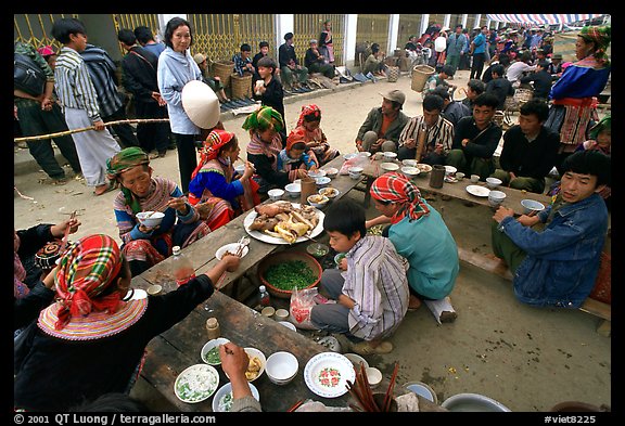 Festing on unusual foods, sunday market. Bac Ha, Vietnam (color)