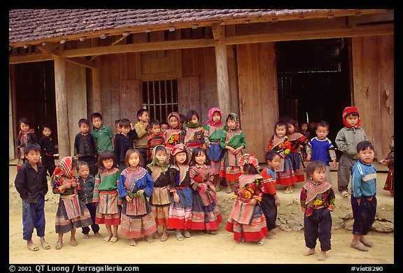 School kids in colorfull everyday dress. Bac Ha, Vietnam (color)