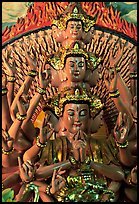 Detail of a buddhist sculpture with many heads. Ha Tien, Vietnam (color)