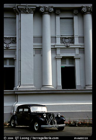 Classic Citroen car in front of city museum. Ho Chi Minh City, Vietnam (color)
